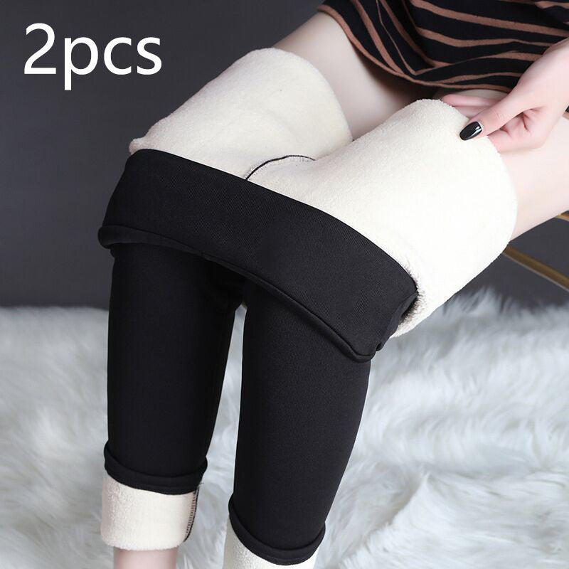 Two-pack of black fleece-lined leggings showing the fleece lining